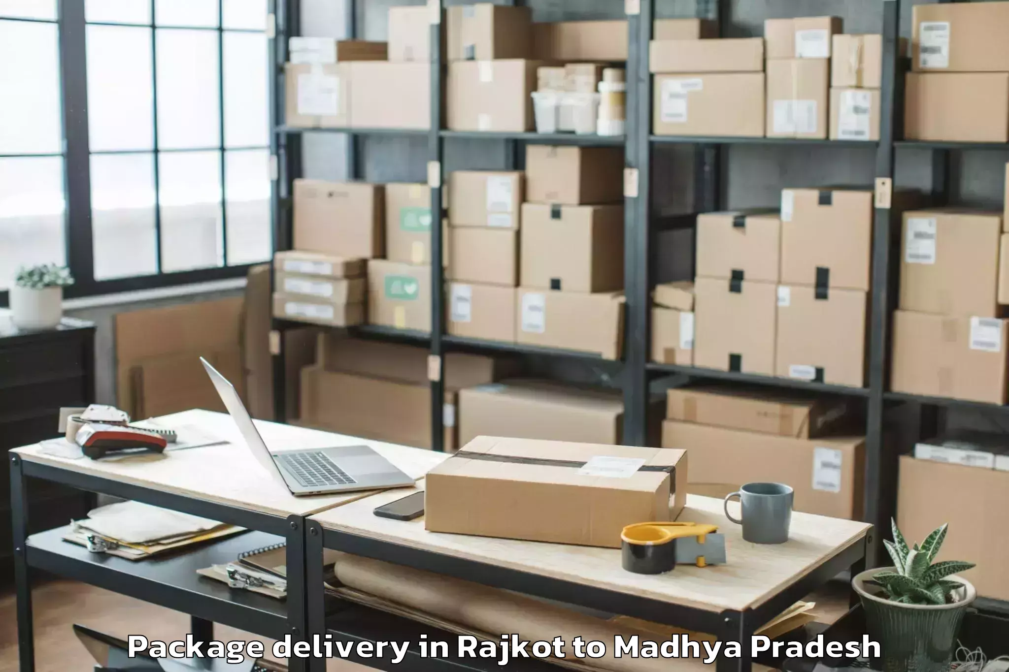 Expert Rajkot to Madhyanchal Professional Unive Package Delivery